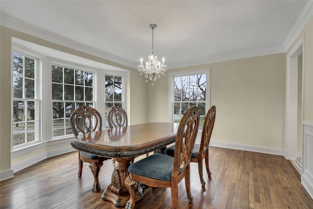 1102 Howell St, Mckinney, TX 75069 - dining room featuring a chandelier, hardwood / wood-style floors, and ornamental molding
