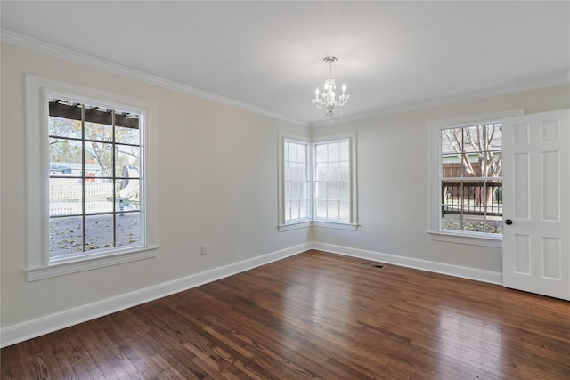 unfurnished room with baseboards, visible vents, dark wood finished floors, crown molding, and a notable chandelier