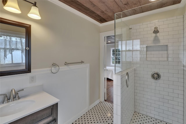 ensuite bathroom with vanity, a shower stall, and wood ceiling