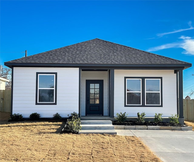 view of front of home with a front yard