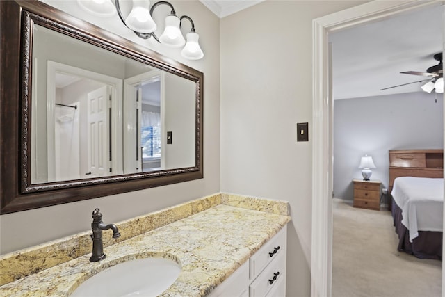 bathroom with ceiling fan and vanity