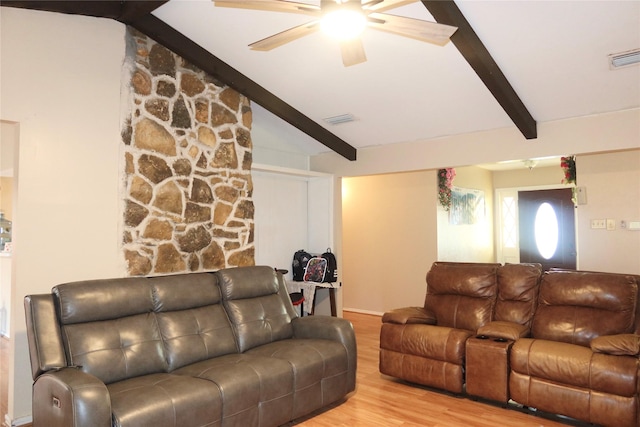 living room with vaulted ceiling with beams, ceiling fan, and light hardwood / wood-style flooring