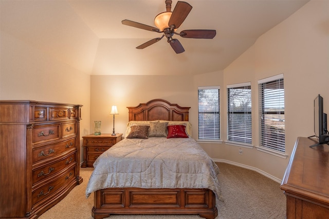 carpeted bedroom featuring ceiling fan and lofted ceiling