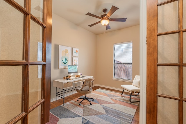 office with wood finished floors, ceiling fan, and baseboards