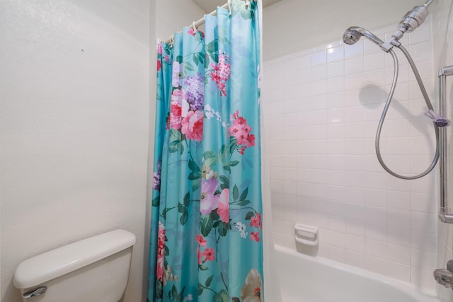 bathroom featuring toilet and shower / tub combo