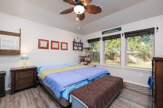 bedroom featuring wood-type flooring and ceiling fan