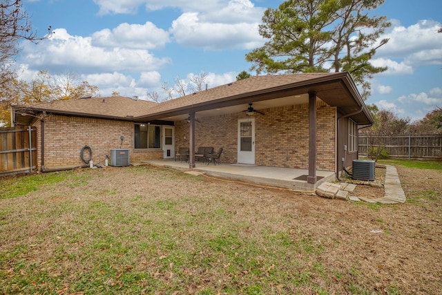 back of house with a yard, a patio, central AC, and ceiling fan