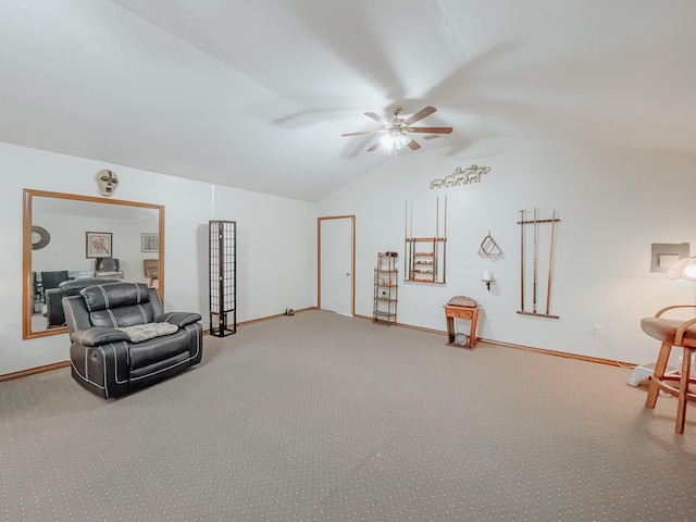 living area featuring carpet, vaulted ceiling, and ceiling fan