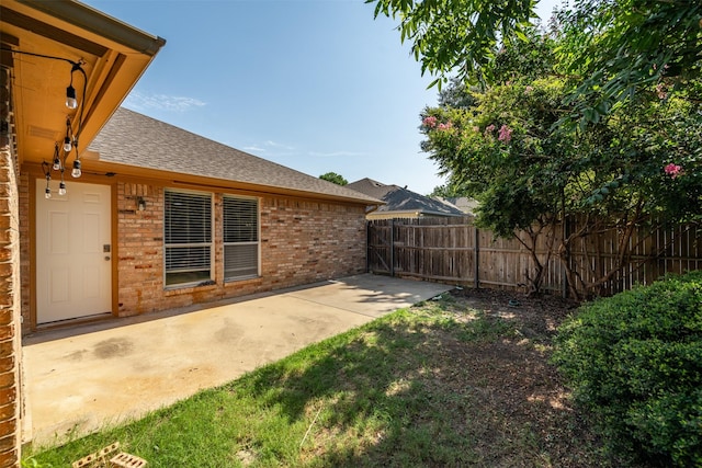 view of yard with a patio area