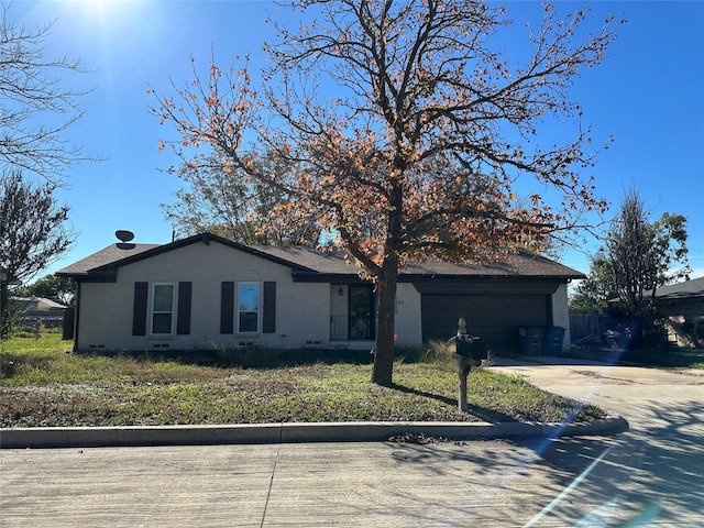 ranch-style house with a garage