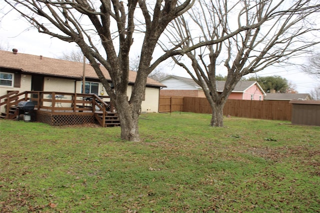 view of yard featuring a deck