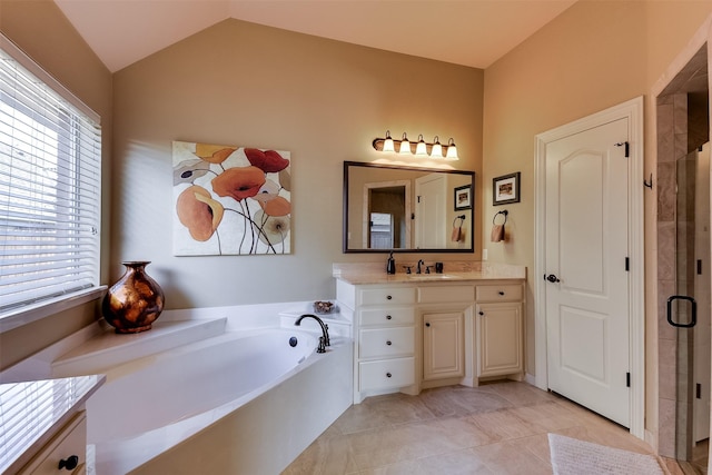 full bath featuring lofted ceiling, a shower stall, vanity, and a bath