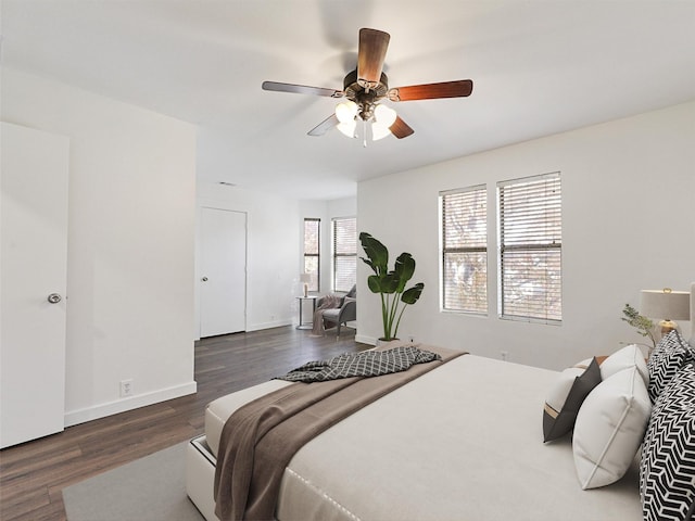 bedroom featuring dark hardwood / wood-style floors and ceiling fan