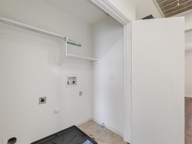 laundry room featuring hookup for a washing machine, gas dryer hookup, and hookup for an electric dryer