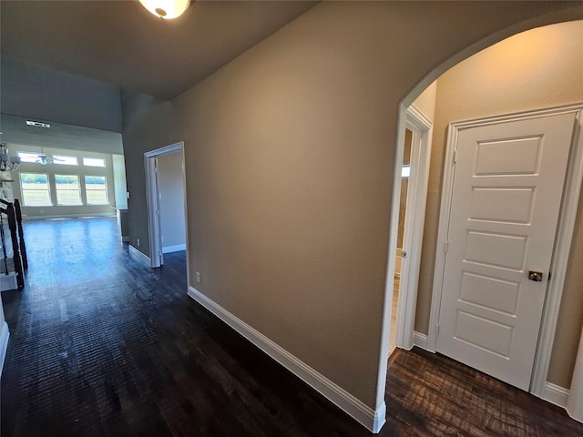 hallway with dark wood-type flooring