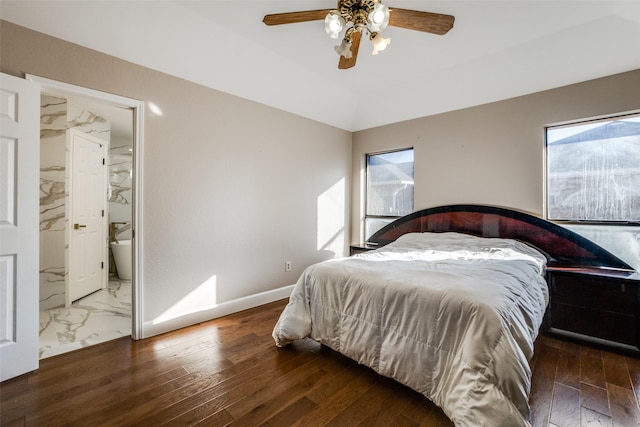 bedroom featuring ceiling fan and dark hardwood / wood-style floors