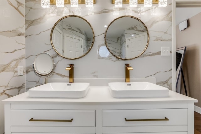 bathroom with vanity and wood-type flooring