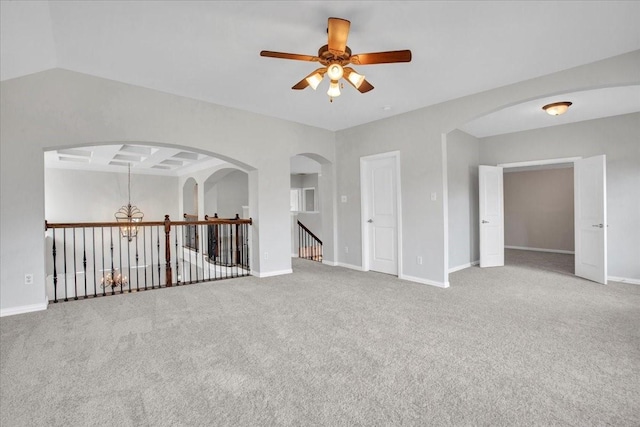 unfurnished room with carpet floors, ceiling fan, and coffered ceiling