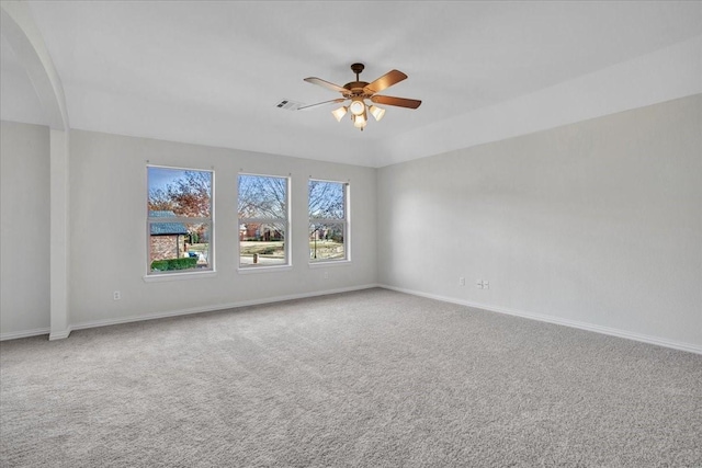 carpeted empty room with ceiling fan