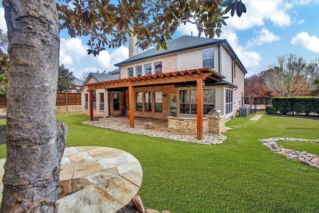 rear view of property featuring a lawn, a patio area, and a pergola