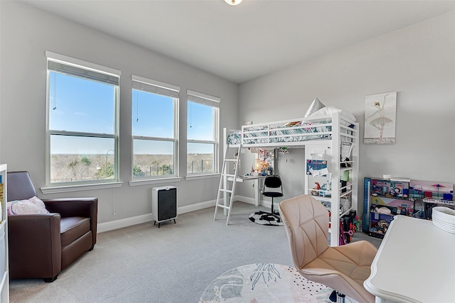 bedroom featuring light carpet