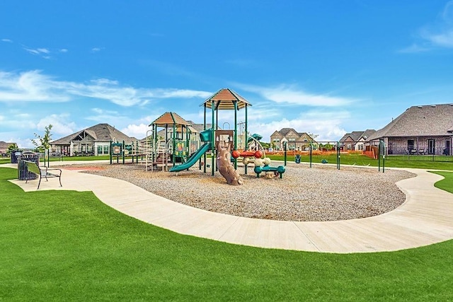 view of playground with a yard