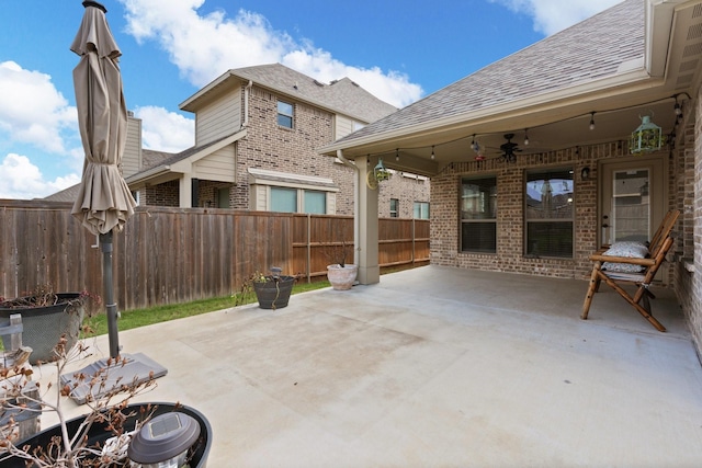 view of patio featuring ceiling fan