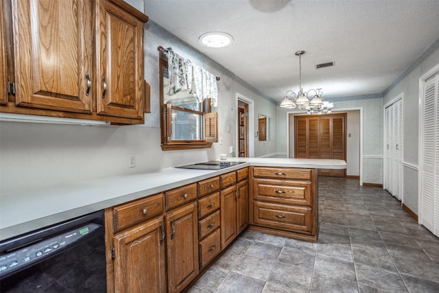 kitchen featuring a notable chandelier, kitchen peninsula, a textured ceiling, decorative light fixtures, and black appliances