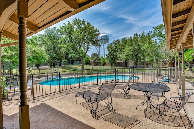 view of swimming pool featuring a patio