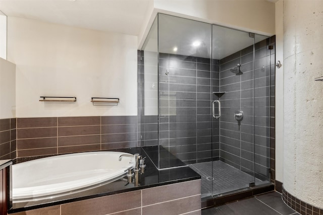 bathroom with tile patterned flooring and plus walk in shower