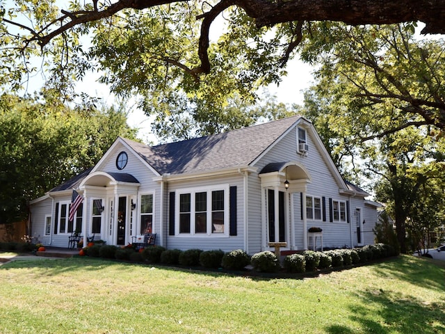 view of front of property with a front lawn