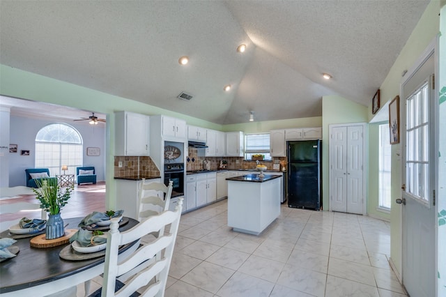 kitchen with tasteful backsplash, a textured ceiling, ceiling fan, black appliances, and white cabinets