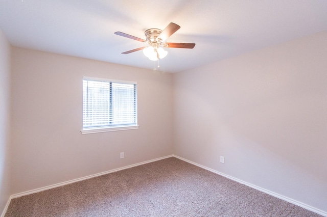 carpeted empty room with ceiling fan