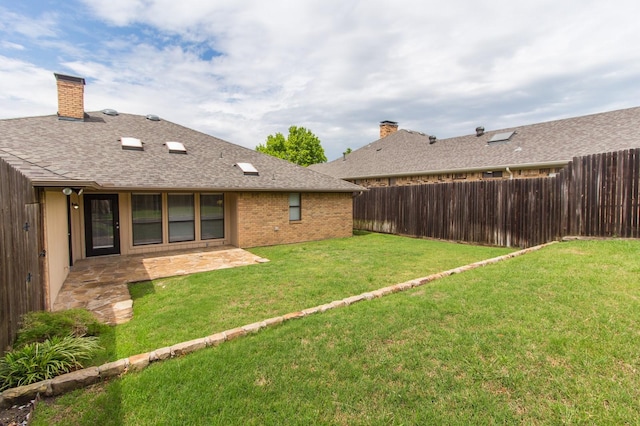 view of yard with a patio area