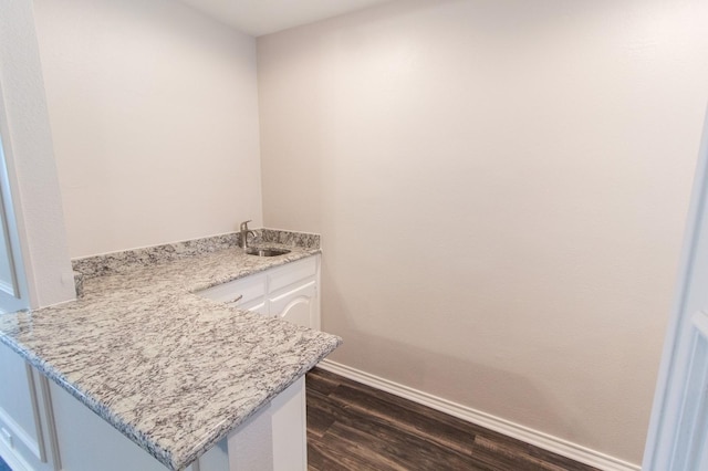 interior space featuring hardwood / wood-style floors and sink