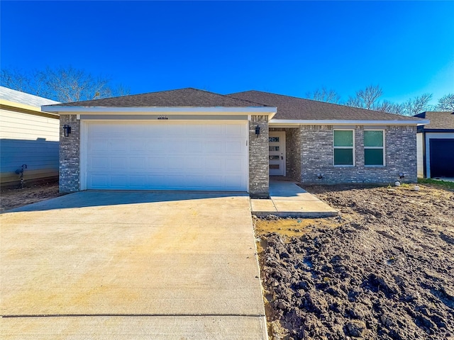 single story home with a garage