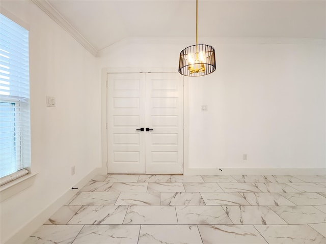 609 E 14th Ave, Corsicana, TX 75110 - spare room with a chandelier, ornamental molding, light marble finish flooring, baseboards, and lofted ceiling