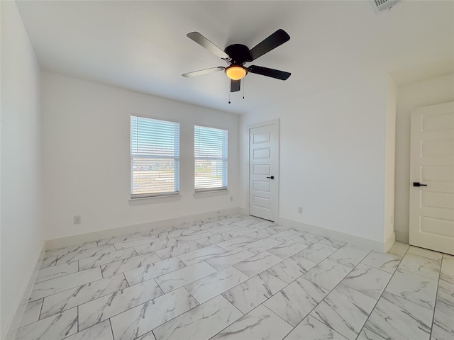 empty room featuring ceiling fan