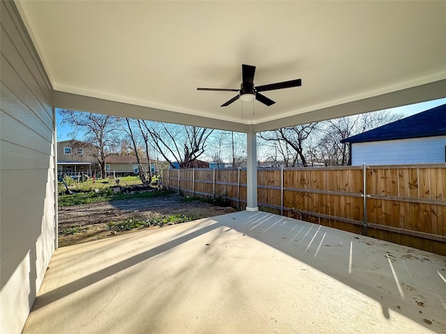 view of patio featuring ceiling fan