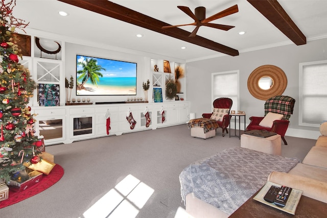 living room with beamed ceiling, carpet, ceiling fan, and crown molding