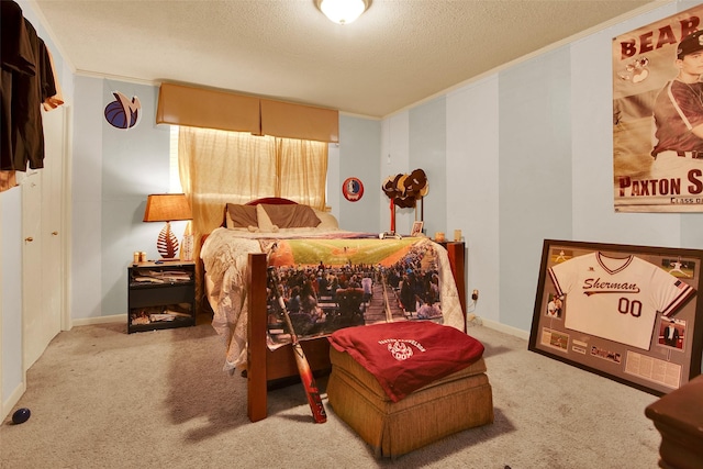 carpeted bedroom featuring crown molding and a textured ceiling