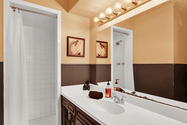 bathroom featuring vanity and walk in shower