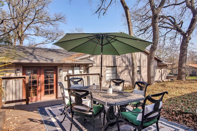 wooden deck featuring french doors