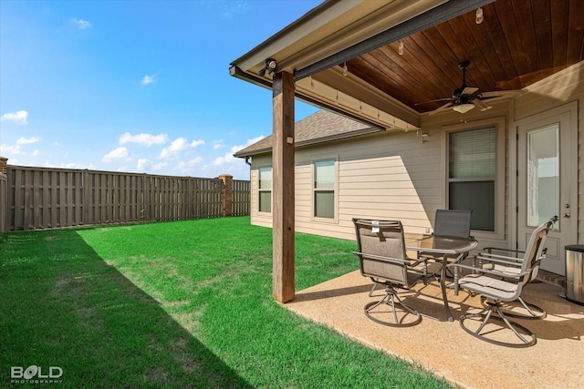 view of yard featuring a patio and ceiling fan