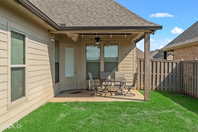 exterior space with a lawn, a patio, and ceiling fan