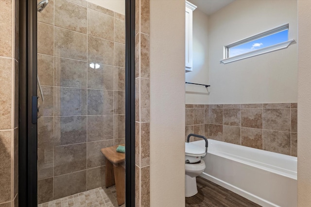 bathroom with hardwood / wood-style floors, toilet, and independent shower and bath