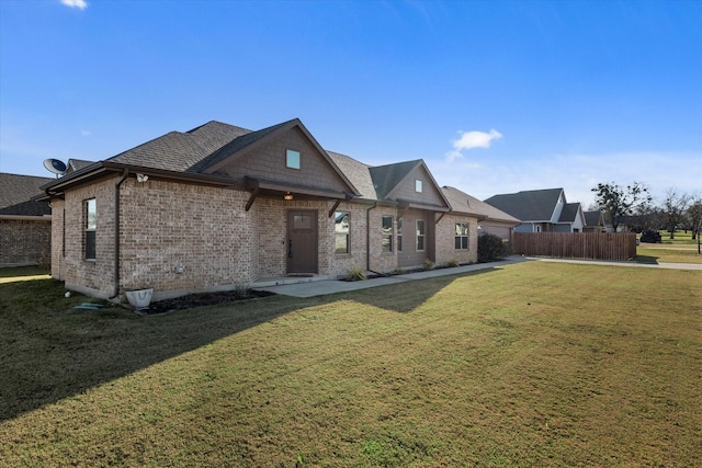 view of front of home with a front yard