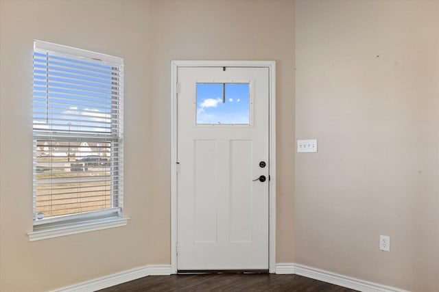 foyer entrance featuring dark hardwood / wood-style flooring