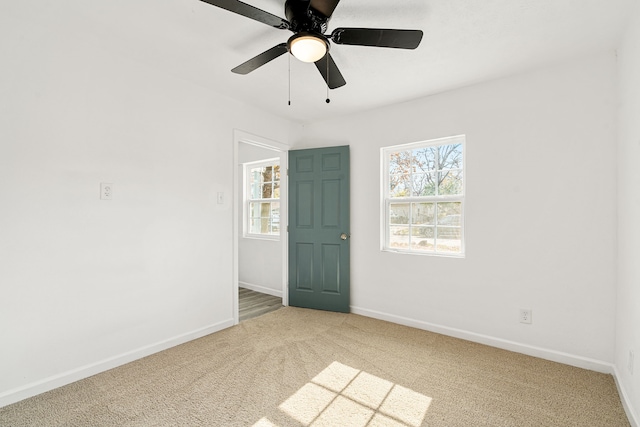 spare room featuring carpet