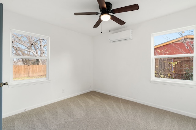 carpeted empty room with ceiling fan, plenty of natural light, and a wall unit AC